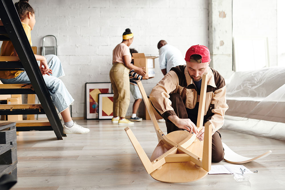 Buildnest team assembling and setting up home furniture – professional handyman and furniture installation services in Niagara Region