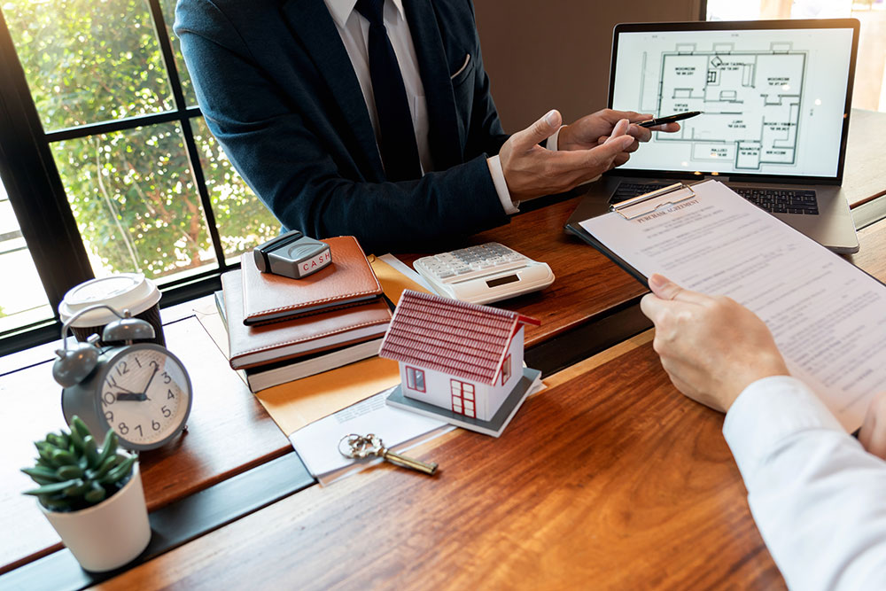 Buildnest property manager organizing short-term rental tasks for Airbnb-style service in Niagara Region — showcasing professional property management with digital tools and client coordination.