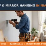 Shelf and mirror hanging in Niagara — BuildNest handyman mounting a floating shelf bracket